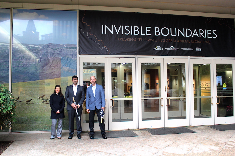 WMI co-sponsored the "Invisible Boundaries" exhibit with National Geographic, Yale School of Forestry and Environmental Studies, and the Buffalo Bill Center of the West. From left to right are Wyoming Nature Conservancy ecologist Holly Copeland, WMI director Matthew Kauffman and WMI Research Associate Hall Sawyer.